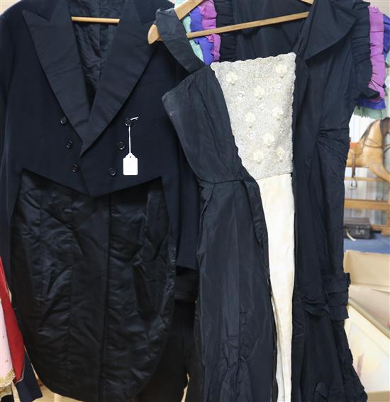 A black taffeta evening dress, another with beaded front panel and a gentlemans coat